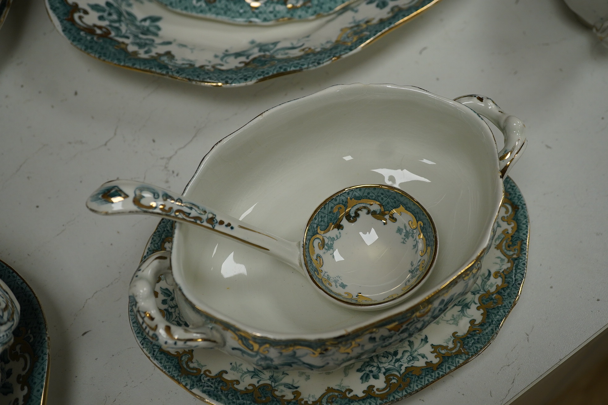 A Staffordshire pottery ‘’Haddon’’ pattern part dinner service. Condition - fair to good